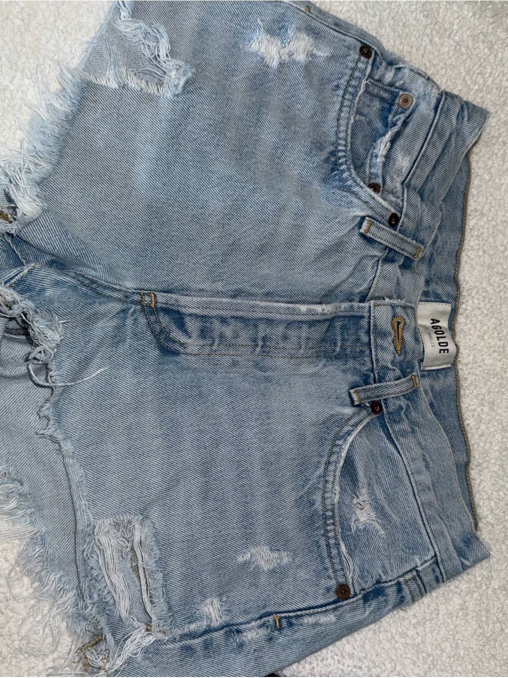 Agolde Light Wash Distressed Denim Shorts